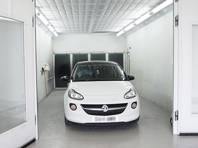 Car in respraying unit